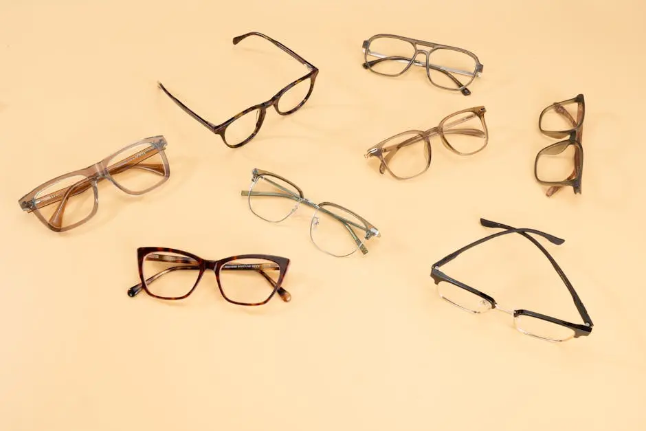 A stylish collection of eyeglasses showcased on a beige background, capturing modern fashion trends.