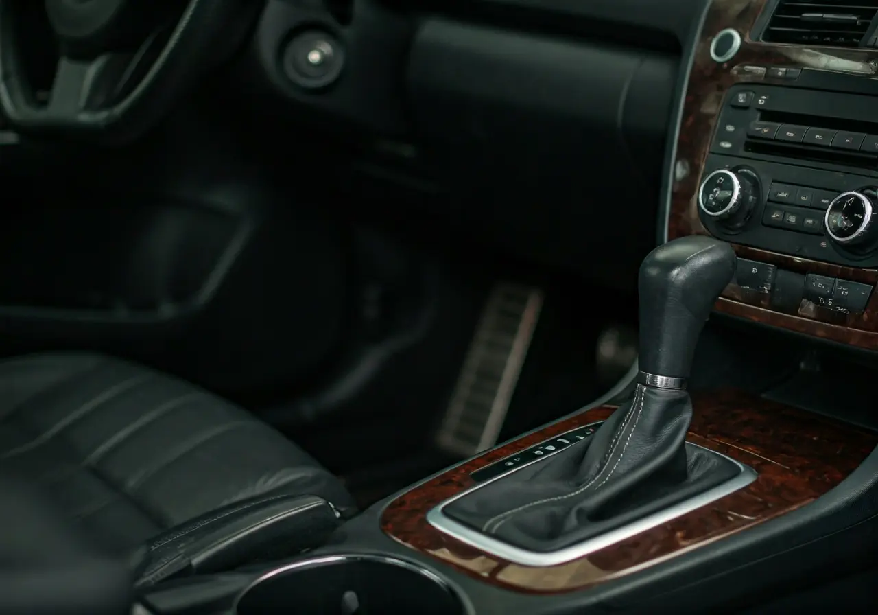 A clean car interior vacuuming in progress in Manchester. 35mm stock photo