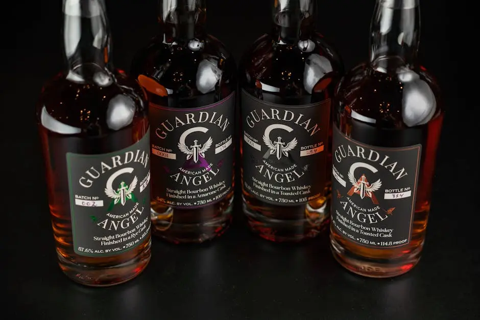 Four Guardian Angel straight bourbon whiskey bottles displayed against a dark background.