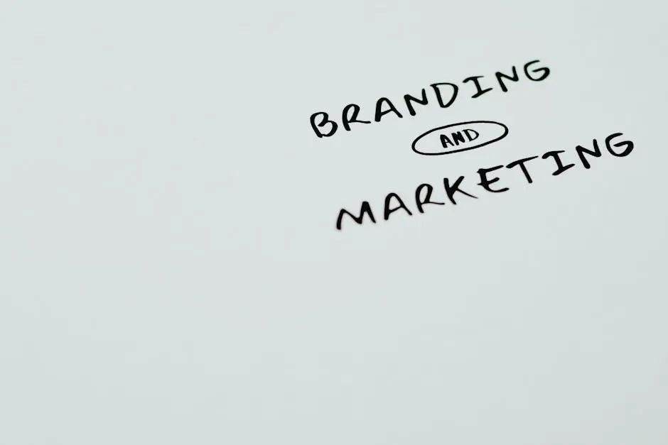 A minimalist image featuring the words &lsquo;Branding&rsquo; and &lsquo;Marketing&rsquo; on a white background, ideal for digital marketing themes.