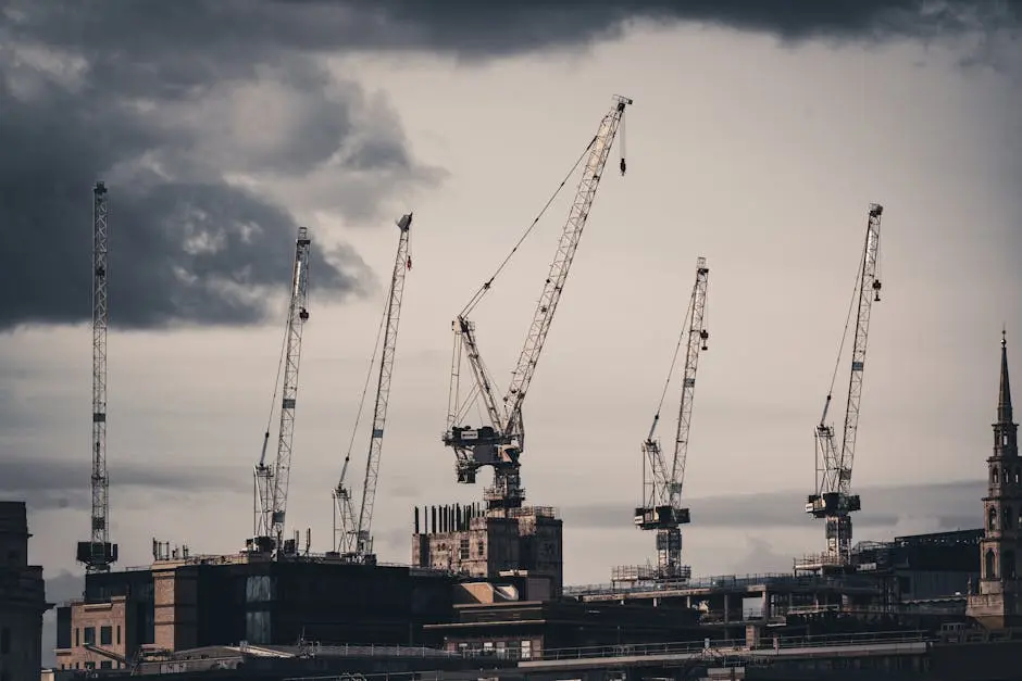 Construction Cranes Against a Stormy Sky