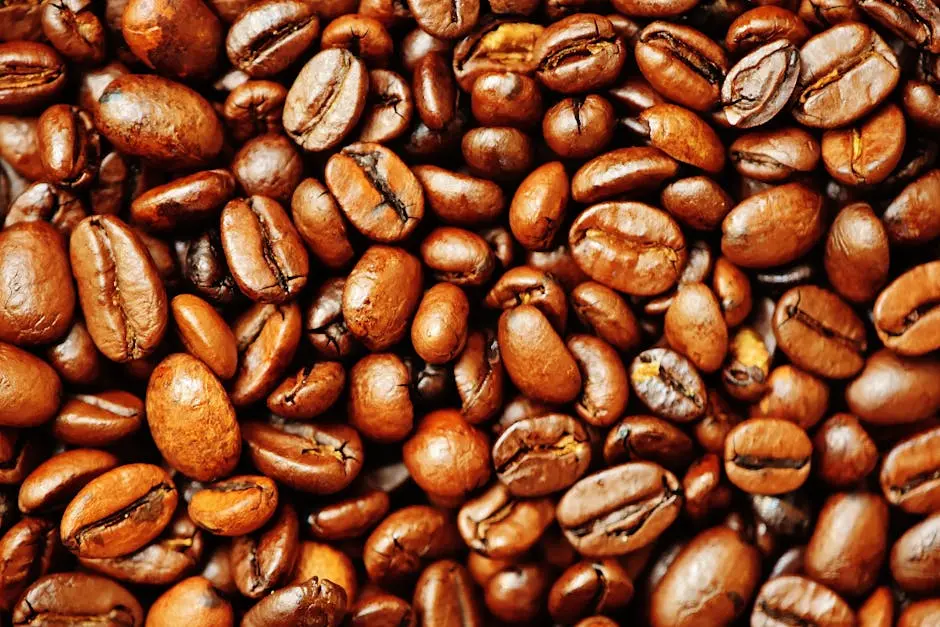 A high-quality close-up shot of roasted coffee beans, highlighting texture and aroma.