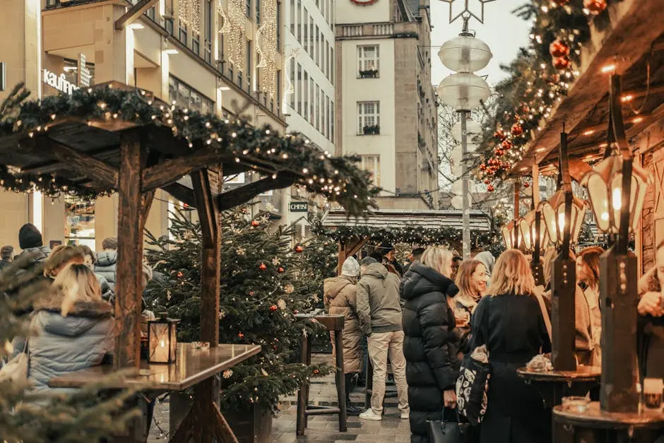 Lively Christmas market scene with festive decorations and people enjoying winter holiday atmosphere.