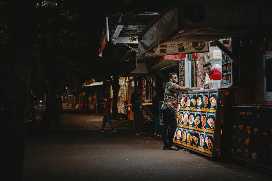 A vibrant night scene capturing an interaction at a street food stall with illuminated menus.