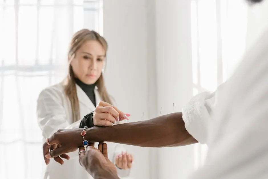 Acupuncture therapy session featuring therapist and patient focusing on wellness.