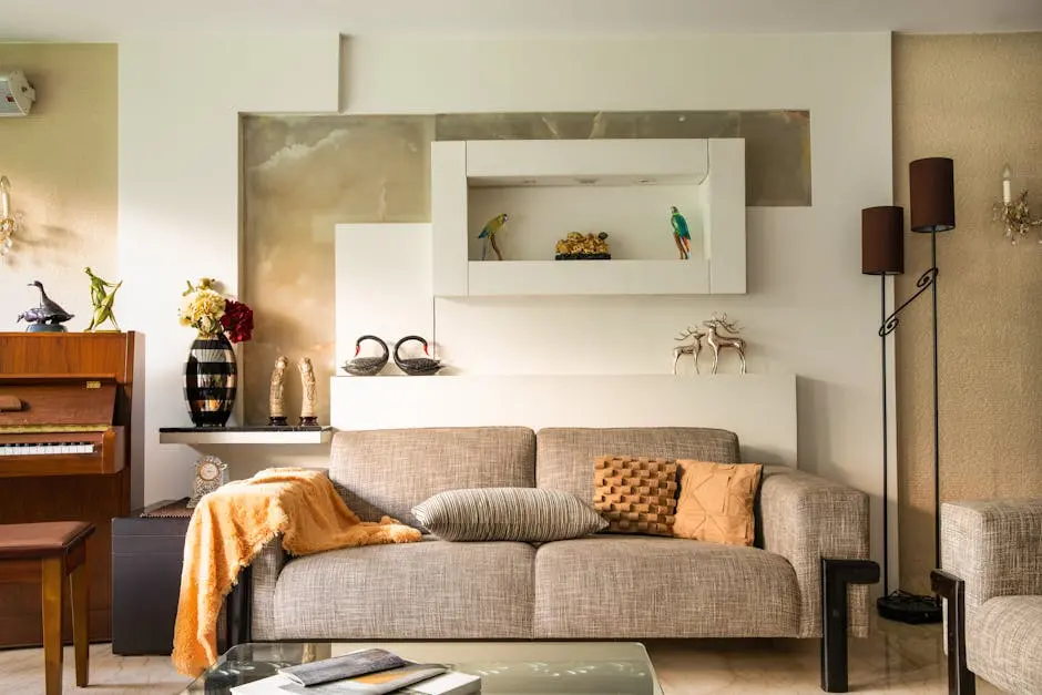 Cozy living room featuring a sofa, decorative items, and a piano, perfect for a stylish home interior.