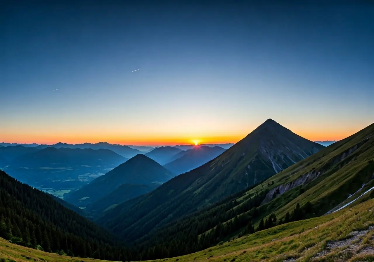 A serene mountain landscape with a calming sunset. 35mm stock photo