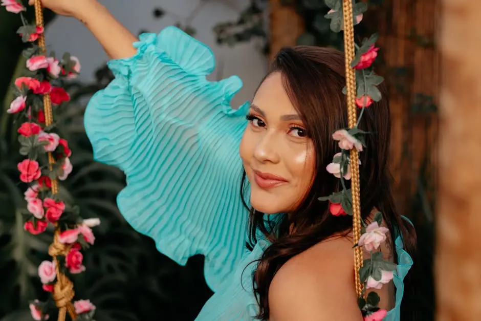 Charming portrait of a woman enjoying a swing adorned with flowers in São Paulo.