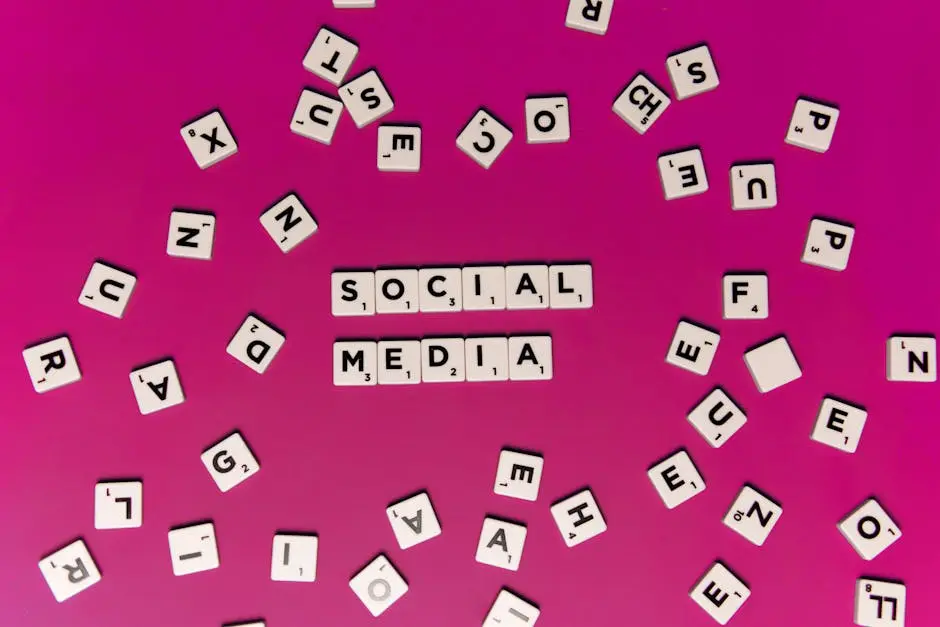 Alphabet tiles forming &lsquo;Social Media&rsquo; on a vibrant pink background, perfect for digital marketing themes.