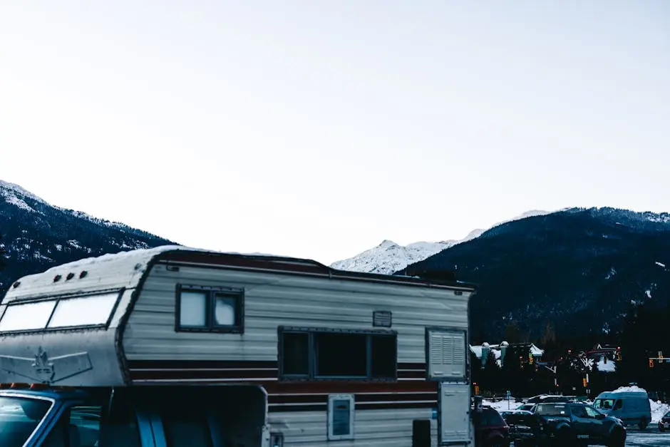 RV camping in snowy Whistler, BC with a stunning mountain backdrop.