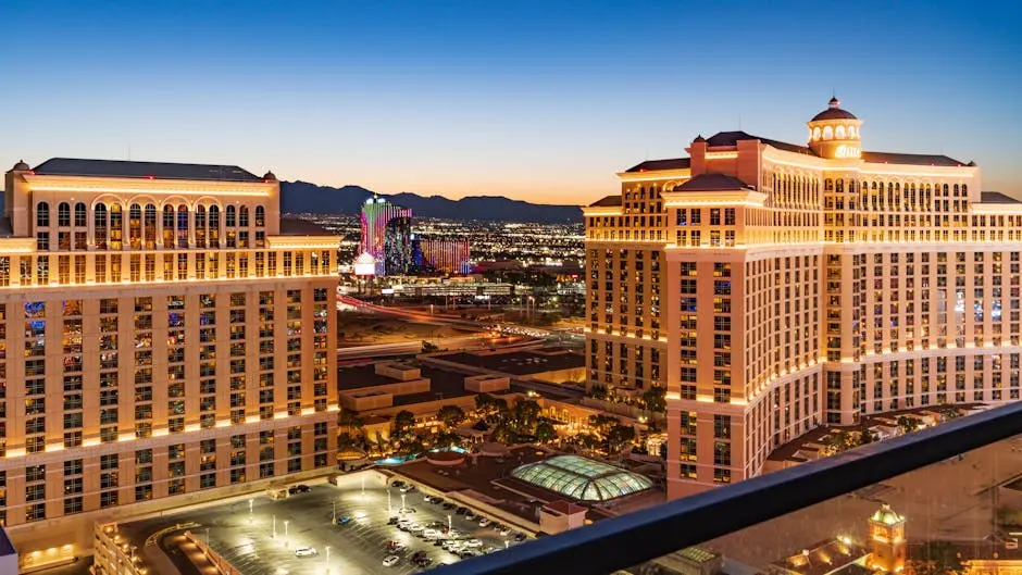 Stunning aerial view of the illuminated Bellagio Hotel and Las Vegas skyline during twilight.