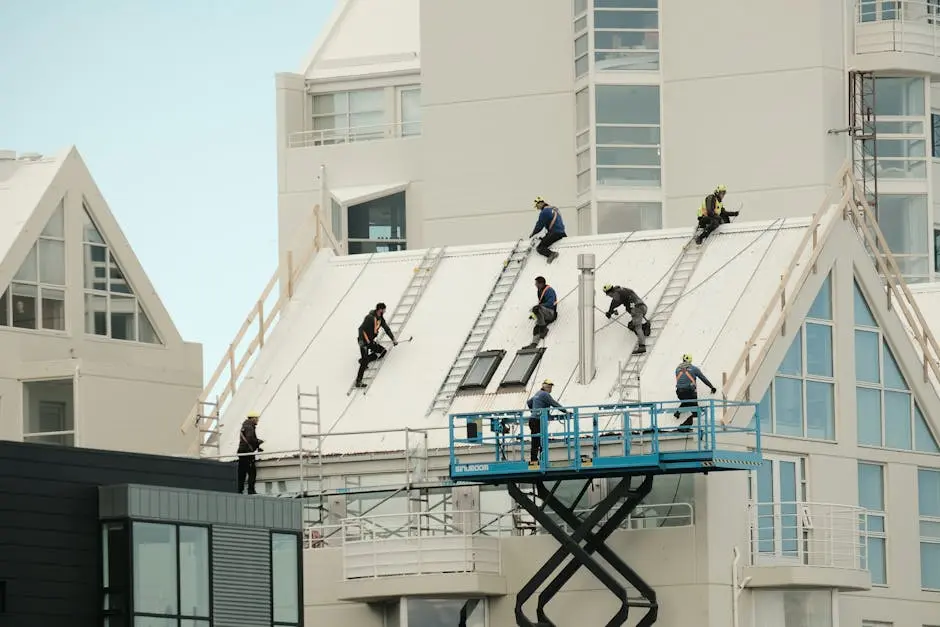 Construction workers repairing a modern roof in Reykjavík, highlighting teamwork and safety.