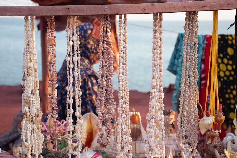Shell jewelry on display at a vibrant market stall by the seaside in Hormoz, Iran.