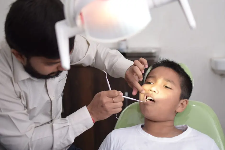 A dentist checks a child’s teeth in a well-lit dental clinic, focusing on oral care.