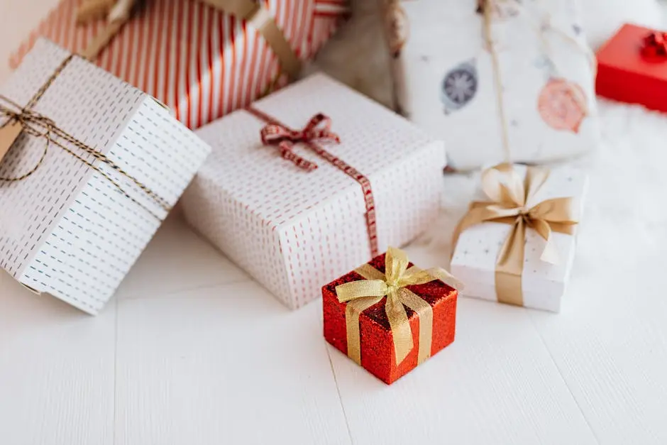 A collection of beautifully wrapped gift boxes with festive ribbons, perfect for holiday celebrations.