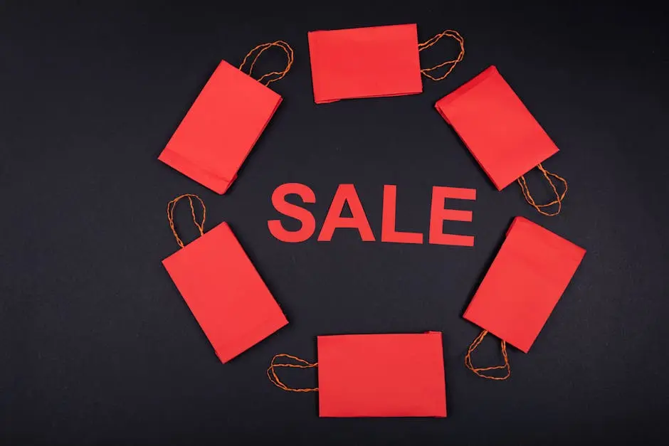 Circular arrangement of red paper bags with ‘SALE’ text on a dark background.