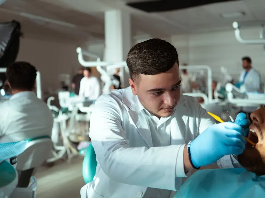 A dentist in a clinic focused on a dental procedure, highlighting modern dentistry.