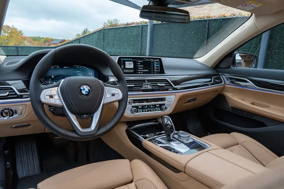 Explore the modern luxury car interior featuring sleek design and advanced technology.