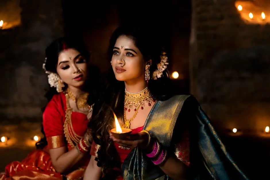 Duas mulheres indianas de sáris segurando uma diya, capturando a essência da elegância e da tradição.
