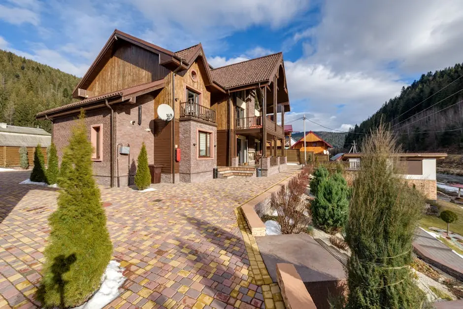 Cozy mountain chalet with spacious driveway and scenic views, perfect for a getaway.
