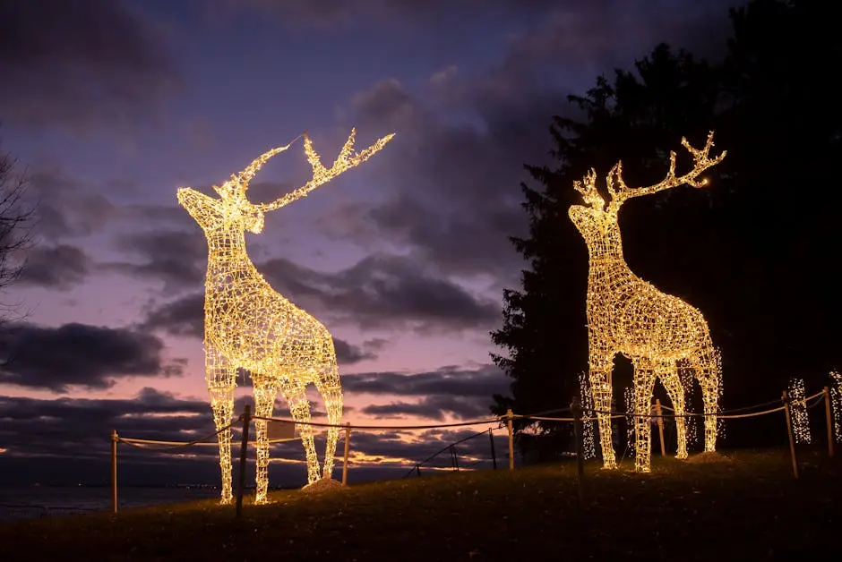 Two glowing deer sculptures under a twilight sky, creating a magical evening ambiance.