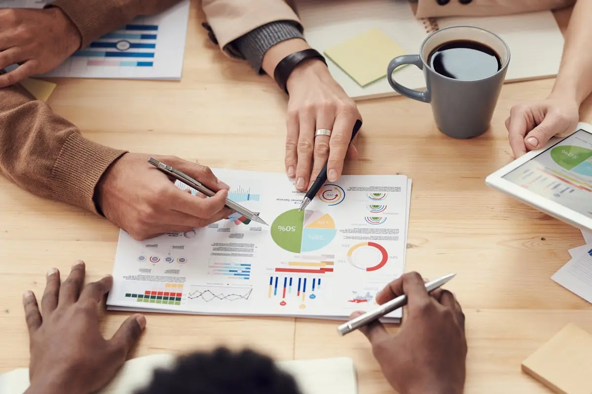 cfo services pricing discussing data and strategy in an office meeting.