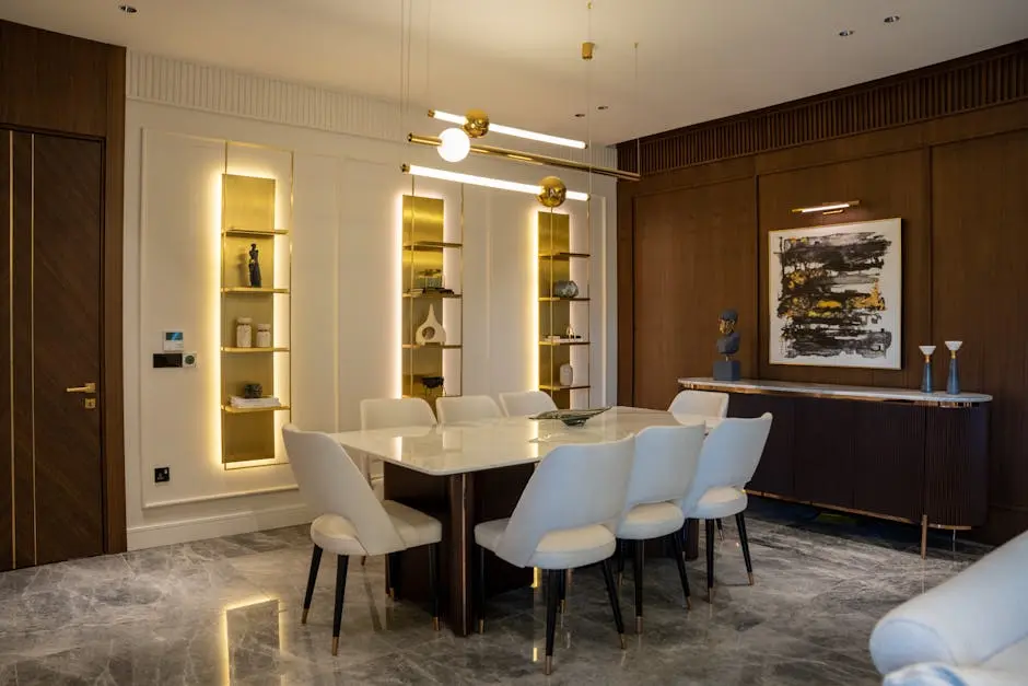 A beautifully designed modern dining room featuring elegant furniture and artistic decor elements.