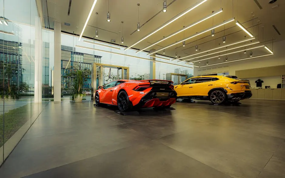 Showroom featuring luxury sports cars, Lamborghini models, with sleek design and modern architecture.