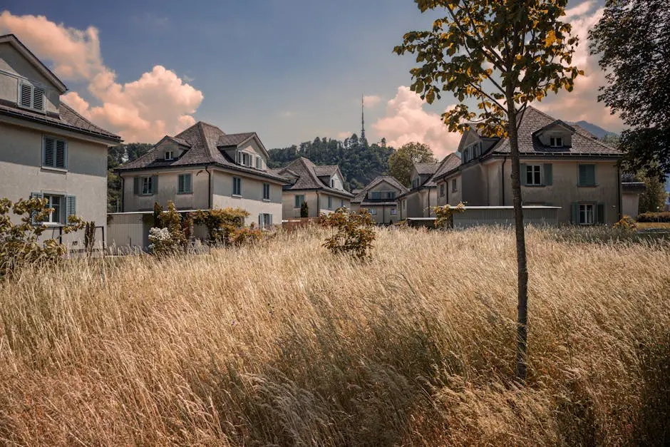 Picturesque houses in a serene residential area of Sankt Gallen, surrounded by nature.
