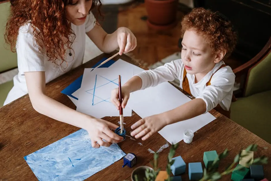 A mother and child engage in a fun and creative art session indoors focusing on painting and drawing.