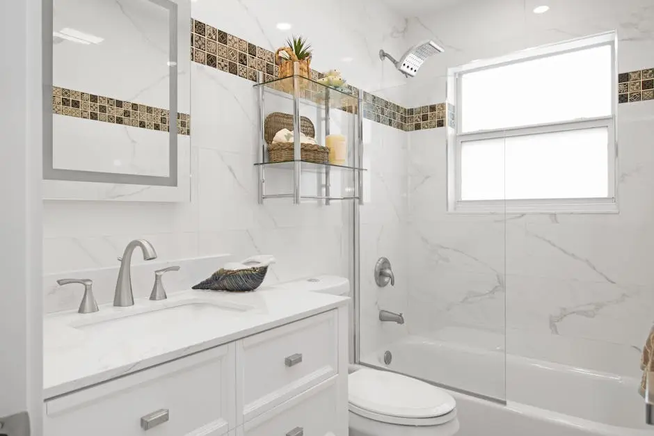 Contemporary bathroom with clean design, marble tiles, and sleek fixtures.