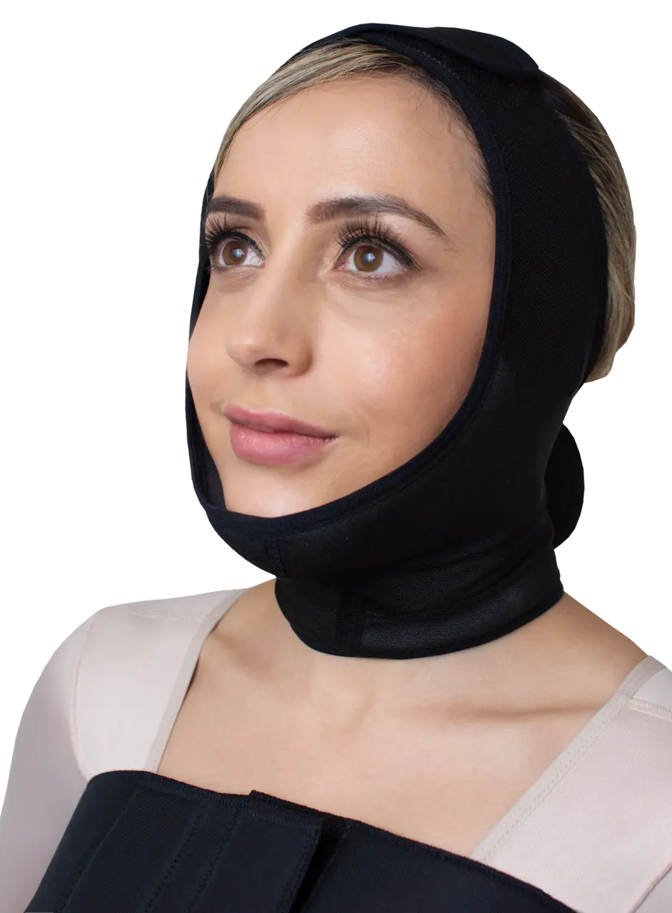 Woman wearing a face compression garment