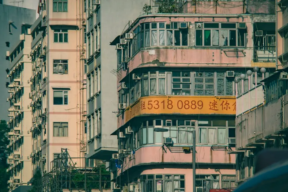 Close-up view of urban apartment buildings showcasing unique architectural details and vibrant colors.