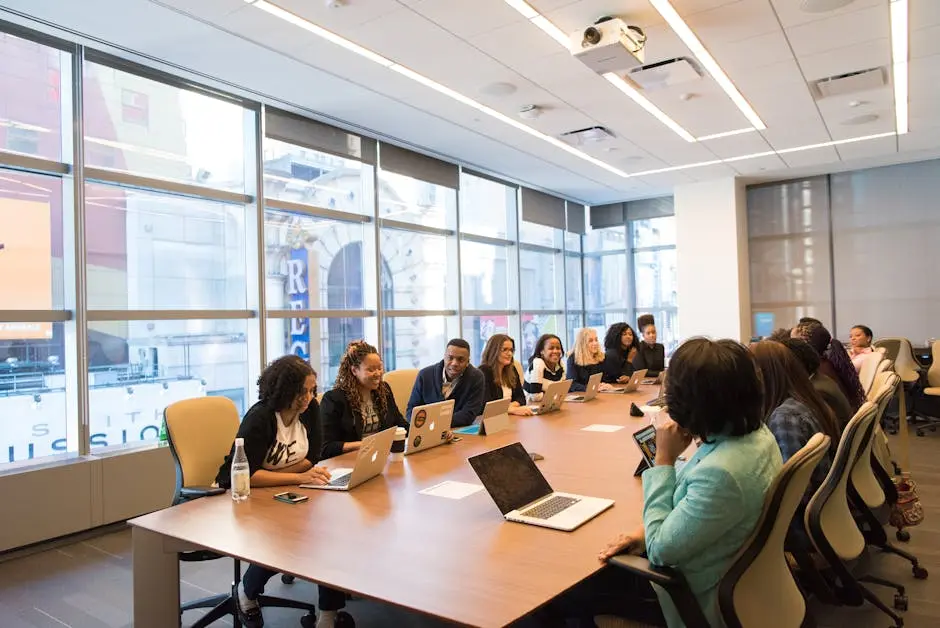A diverse team of business professionals collaborating in a modern meeting room. virtual cfo services | your neogig