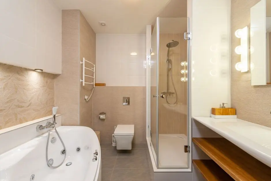 Contemporary bathroom featuring bathtub, shower, and elegant interior design elements.