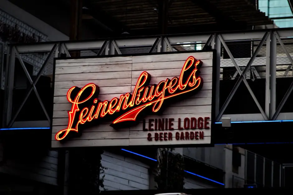 Vibrant neon sign promoting a beer garden, captured at night with warm lighting and modern design.