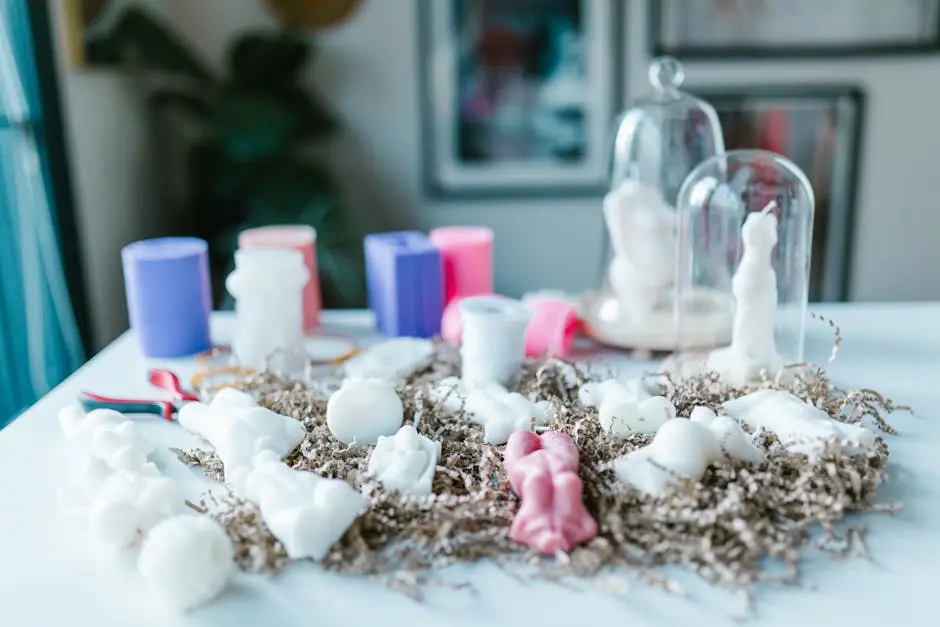 Artistic arrangement of handmade candles on a table with a focus on creativity and craft.