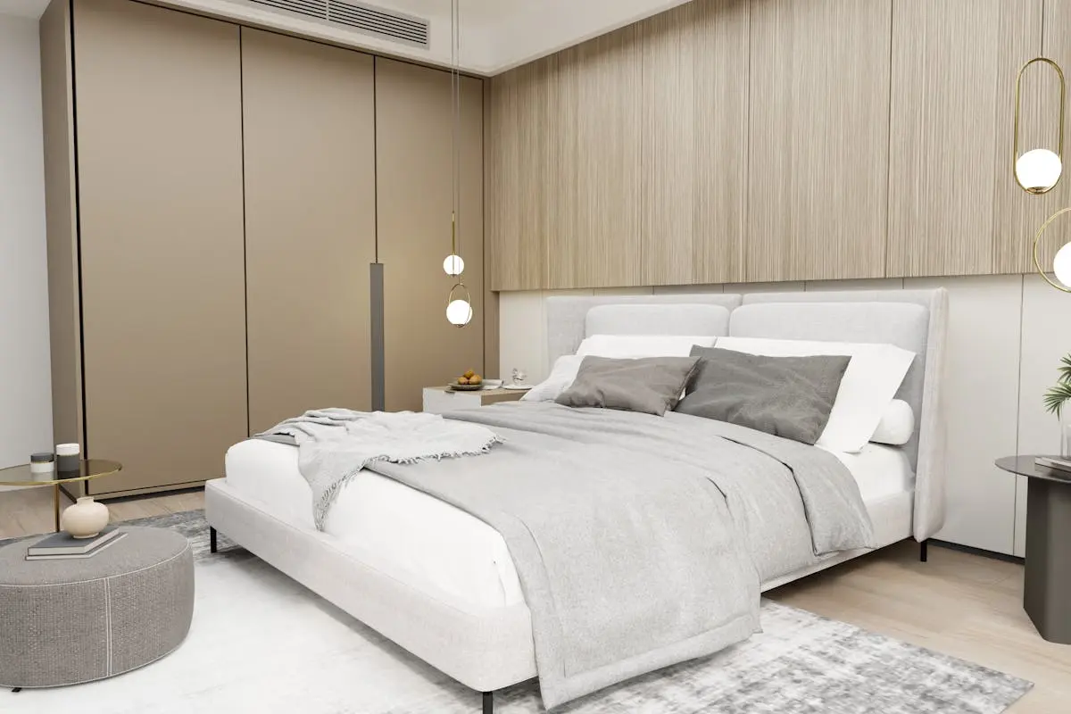 Luxurious and cozy modern bedroom with a minimalist design and natural tones.