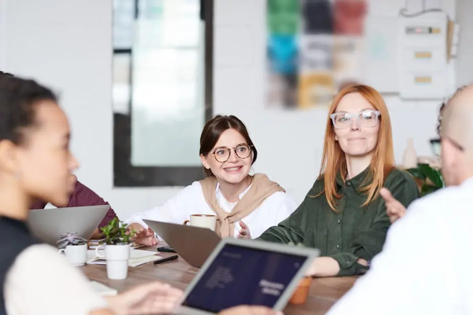 A group of diverse professionals collaborating in a modern office setting.