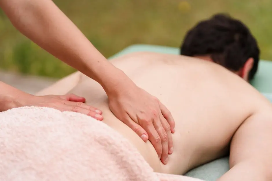 Close-up of hands performing a relaxing massage outdoors. Ideal for wellness and relaxation themes.